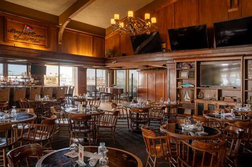 Our bar overlooking the water. Large TVs to watch the best games